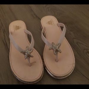 Pink sparkly star fish bottom flip flops